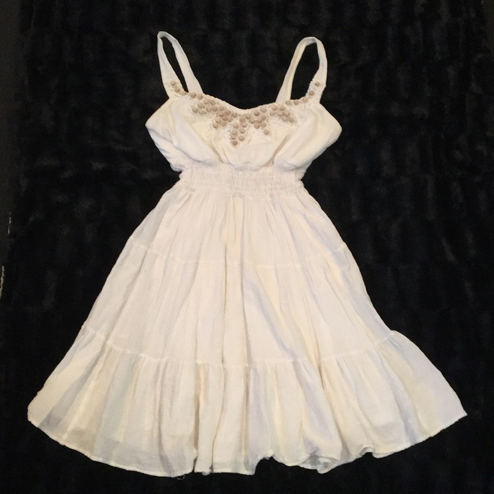 Super cute little white dress!